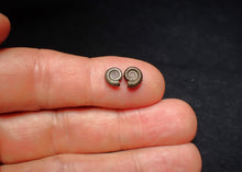 Load image into Gallery viewer, Matched pair of tiny Crucilobiceras ammonite fossils (7 mm)
